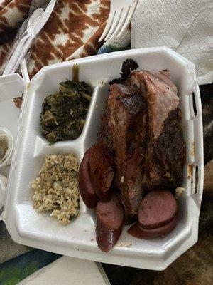 I got the three meat plate with sausage,ribs and brisket with a side of collard greens in dirty rice.