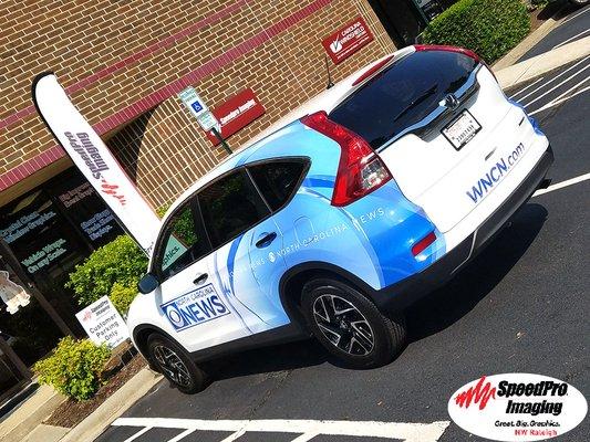 Bright New Vehicle Graphics Installed for WNCN-CBS--Speedpro Imaging NW Raleigh recently provided this company with a 3/4 partial wrap.