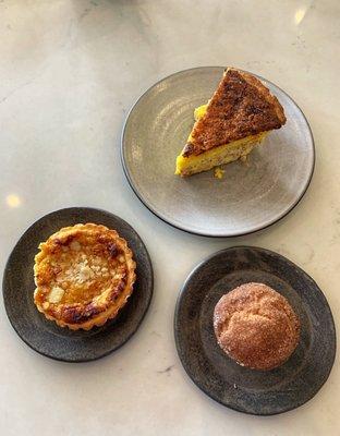 Quiche, passion fruit tart, and morning bun