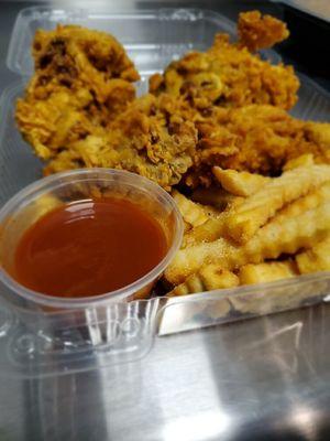 Excellently seasoned lemon Cajun fried chicken - mushrooms flash-fried in vegan oi and served with delectable French fries