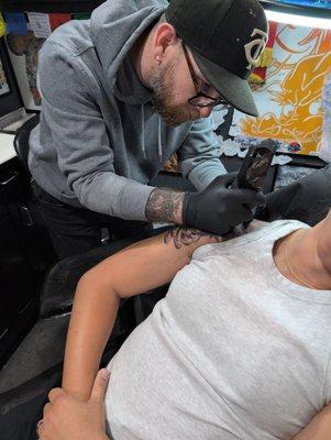 Steve tattooing