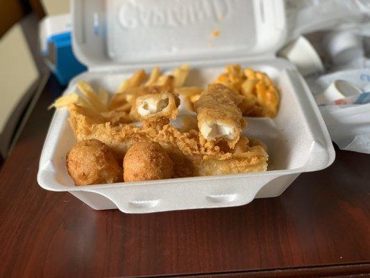 3 piece fish with fries and Mac. (~$8)