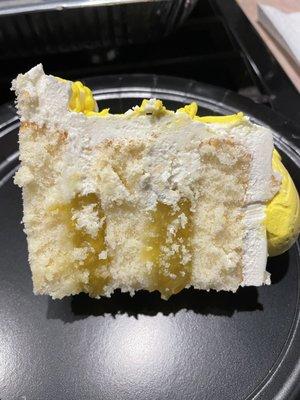 White cake with pineapple filling; buttercream icing.