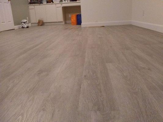 Luxury Vinyl Plank in the family room and kitchen