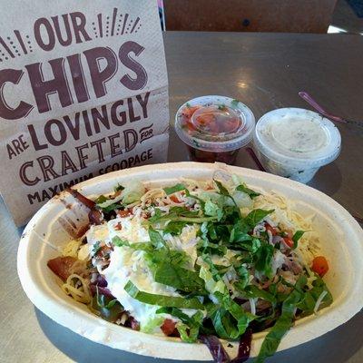 My favorite. Burrito bowl with sour cream, black beans, cheese, carnitas, salsa and lettuce. It doesn't seem as big as it used to be though.