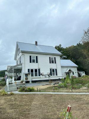 The side of the inn with their garden