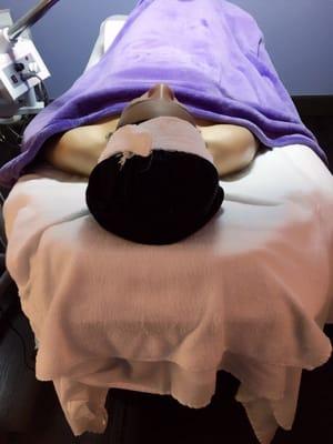 Client asleep during brow waxing and facial treatment. Comfort is our  priority. -Skinchology