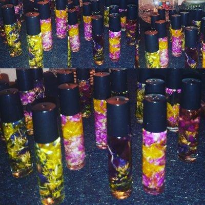 Healthy Body oils with Flowers and natural perfume in glass roller bottle