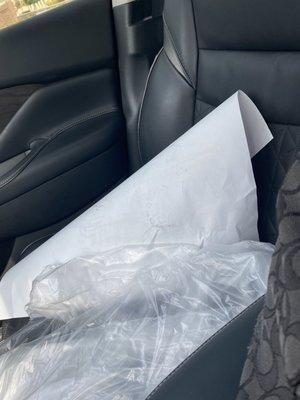 Trash left in my car at planet Nissan by service department.