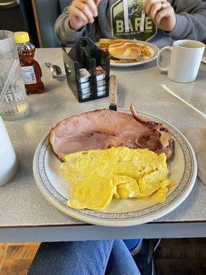 Country ham & 2 eggs w/ a biscuit on the side.