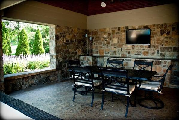 Entertain guests in your outdoor living space complete with wireless streaming music in the background and the big game on th...