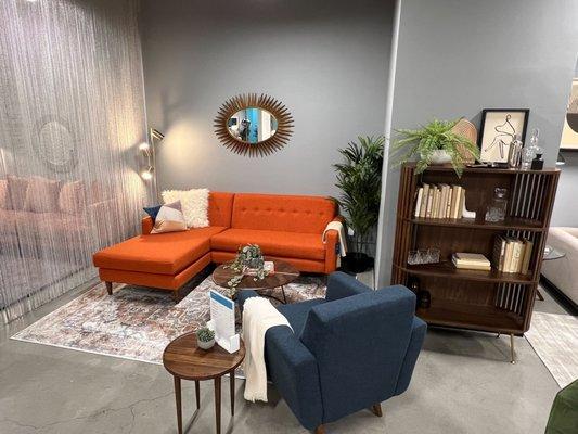 Mid Century Modern Furniture - Korver Apartment Secitonal in Vibe Sunkist, Hughes Apartment Chair, Vira Bookcase and Garnet Washable Rug