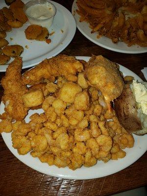 Pick any 3. Popcorn shrimp, chicken tenders, scallpps. Side deviled crab.