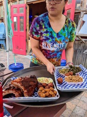 Dinner is served! Our hostess brought these particular plates out. Cool Blue Note Grill shirt.