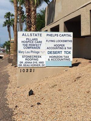 Street signage in front of our building on 32nd St.