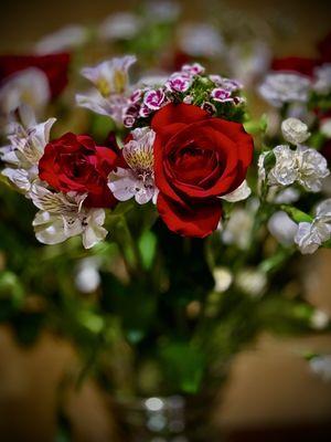 Little flowers arranged with roses at Little Flower Church