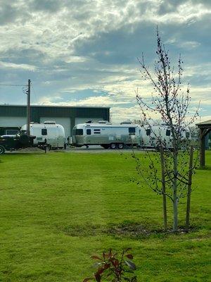 A few Airstreams in for repair, and a portion of his shop.