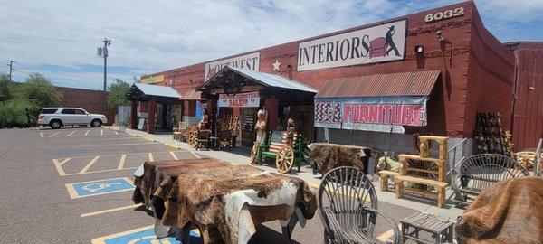 Nice original furniture and paintings with the western motif. No pics; respect to the artists!