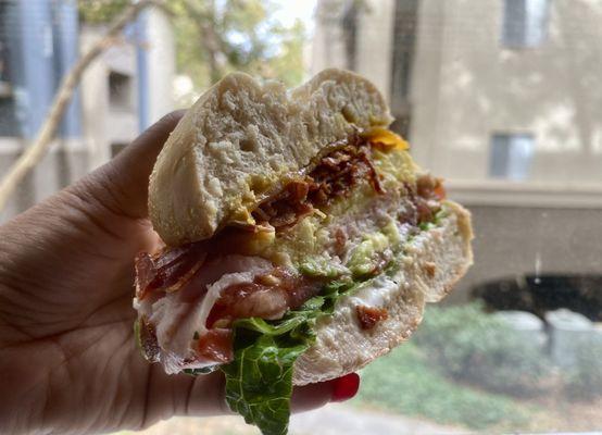 4. Bacon Breakfast Bagel with added tomato, lettuce, avocado, mustard, mayonnaise, and onions