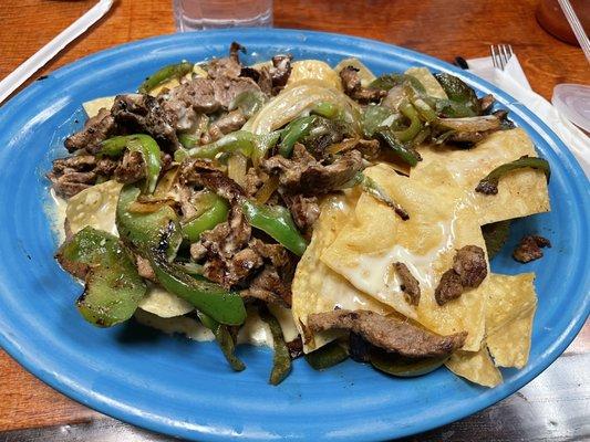 Half fajita nachos (no tomatoes).