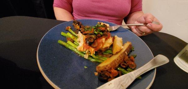 Salmon with Capers on a bed of Asparagus with potato wedges