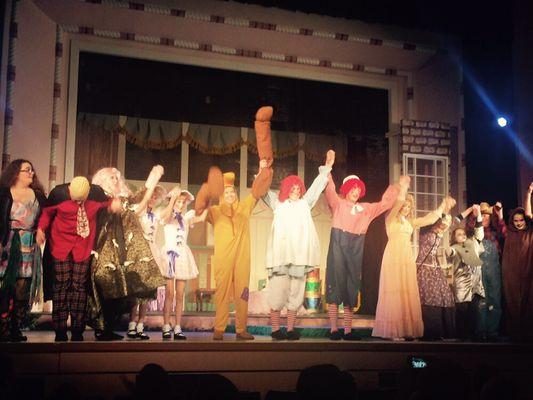 The cast, taking a bow