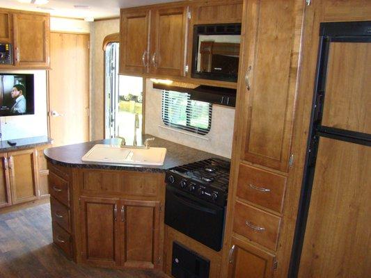 Full kitchen or kitchenettes in all travel trailers