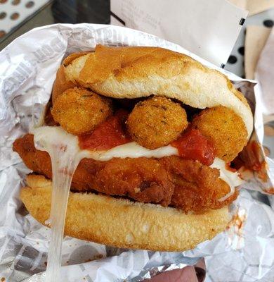 Chicken sandwich topped with mozzarella cheese AND fried cheese sticks?!? So decadent!