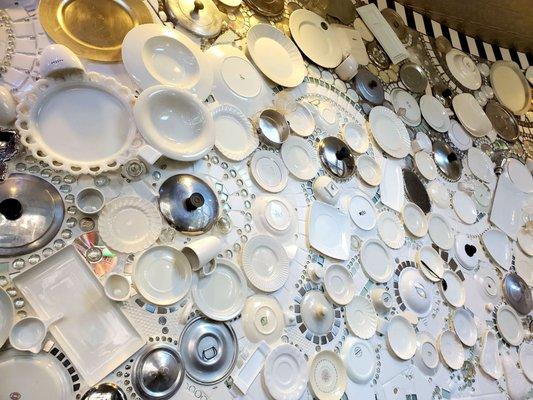 The wall!!!! Plates, saucers, etc mounted via grout ! Soooooo cool!!!!!