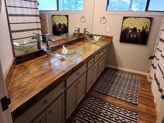 New butcher block counters and vessel sinks