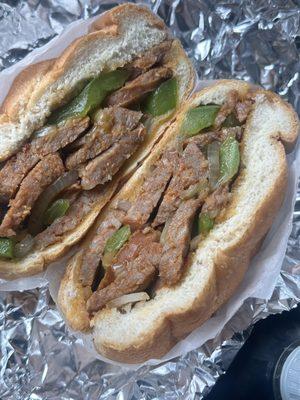 Sausage peppers and onions on a roll