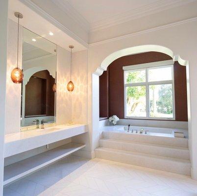 marble floating vanity, tub deck and stair treads, full height marble slab splash