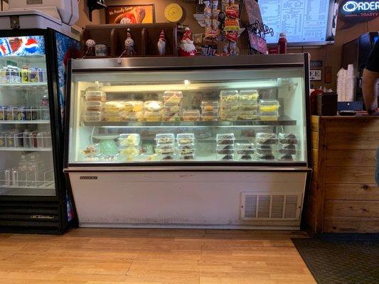 This bakery case only showcases part of their homemade goods.