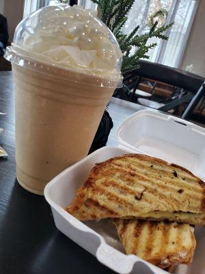 Coconut frappe and bacon,egg cheese sandwich on artisan bread