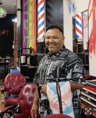 Barber shop Owner Ángel Benitez. Always welcoming its shop vlients