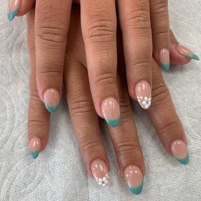 Green tips with white flowers