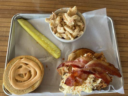 Fried Chicken sandwich with Cole slaw and bacon.