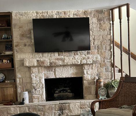 Fireplace with tv mounted.