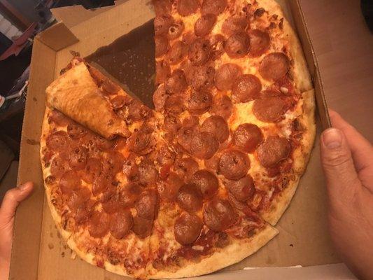 Ordered the pepperoni pizza & it was drenched in grease. Couldn't even pick a pizza slice up with grease pouring from the slice. Soggy too.