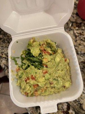 Large Guacamole salad- the guacamole portion wasn't as large as it seems. The greens beneath gives it height, making it seems like a  lot.