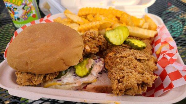 Combo, chicken slider, chicken tender, and fries [made it cheese fries]