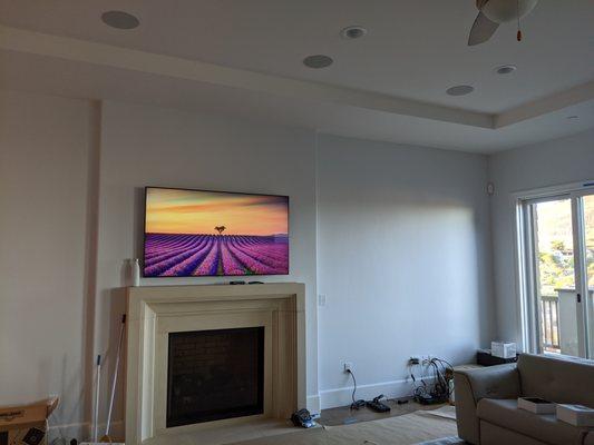 65" TV hung and wires hidden.