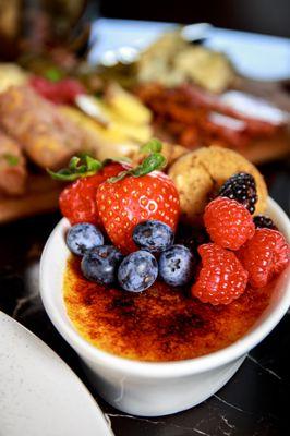 Crème Brulee. Served with Cookies and Fresh Berries.