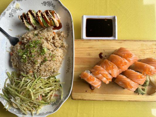 L is lunch special #1. Cucumber Salad, Plain Fried Rice, Odessa Roll Lunch Special and R is Salmon Lover Roll...delicious!!