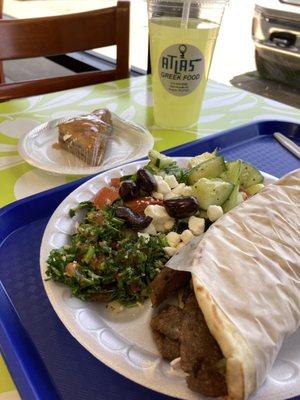 Lemonade, baklava, gyro and salad.