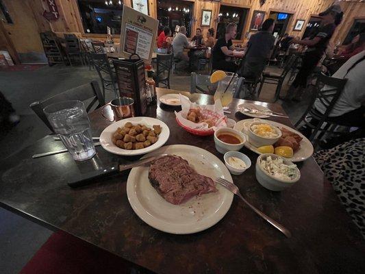 Kansas City New York Strip (rare), fresh fried okra, fried cauliflower. Fried fish, very creamy macaroni and cheese and coleslaw.