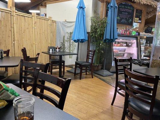 Inside dining area with four tables