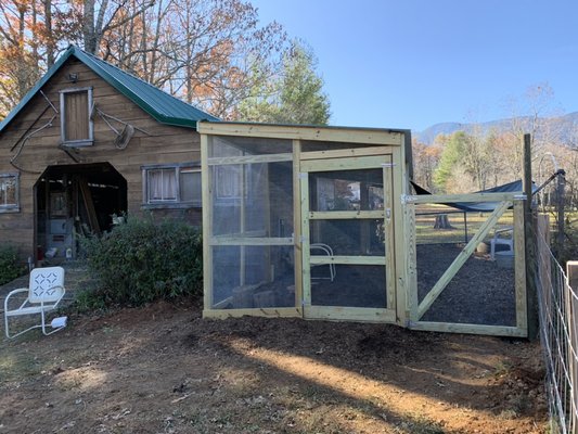 We built this chicken run for our Celo neighbor. We buried wire mesh all around to keep predators out!