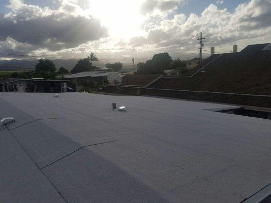 Recently completed metal conversion to cap sheet roof.