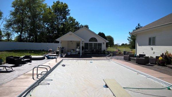 Pool house overlooking fox auto cover pool.